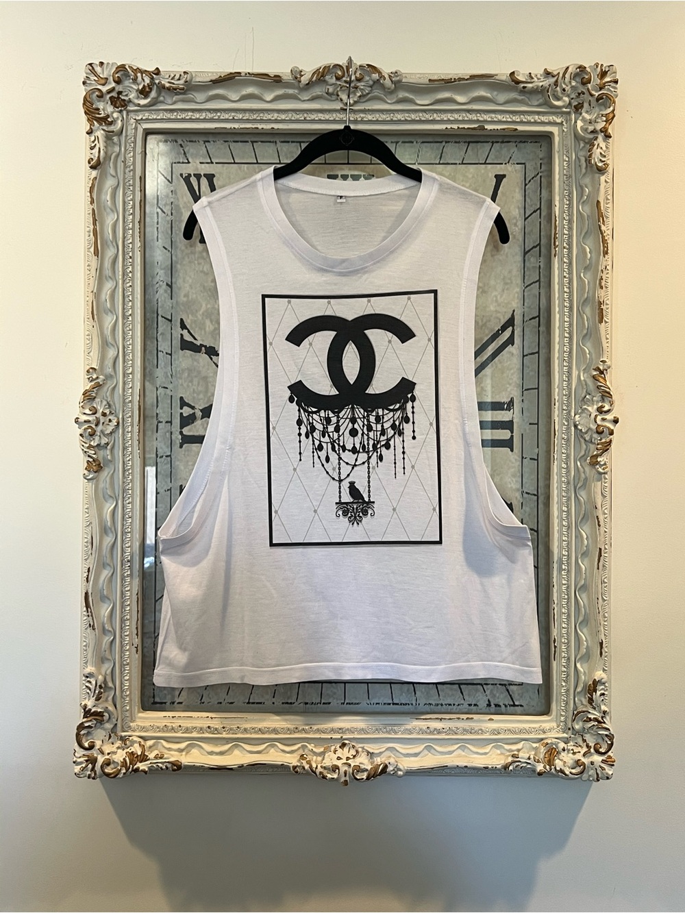 Deep Cut Sleeveless Graphic Tank Top with Chandelier CC logo Motif - White